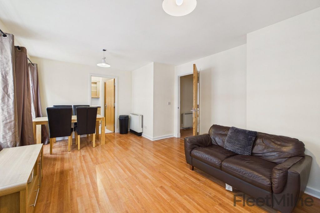 Property photo 3 of 12 Living Area