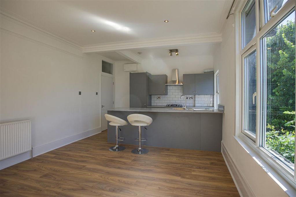 Property photo 2 of 10 Open-Plan Kitchen &amp; Living Area