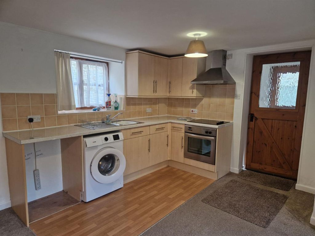 Property photo 1 of 10 Kitchen Area