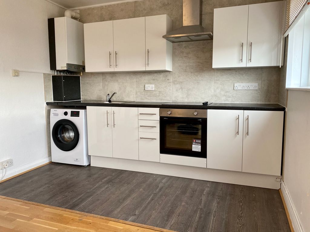 Property photo 3 of 7 Kitchen Area