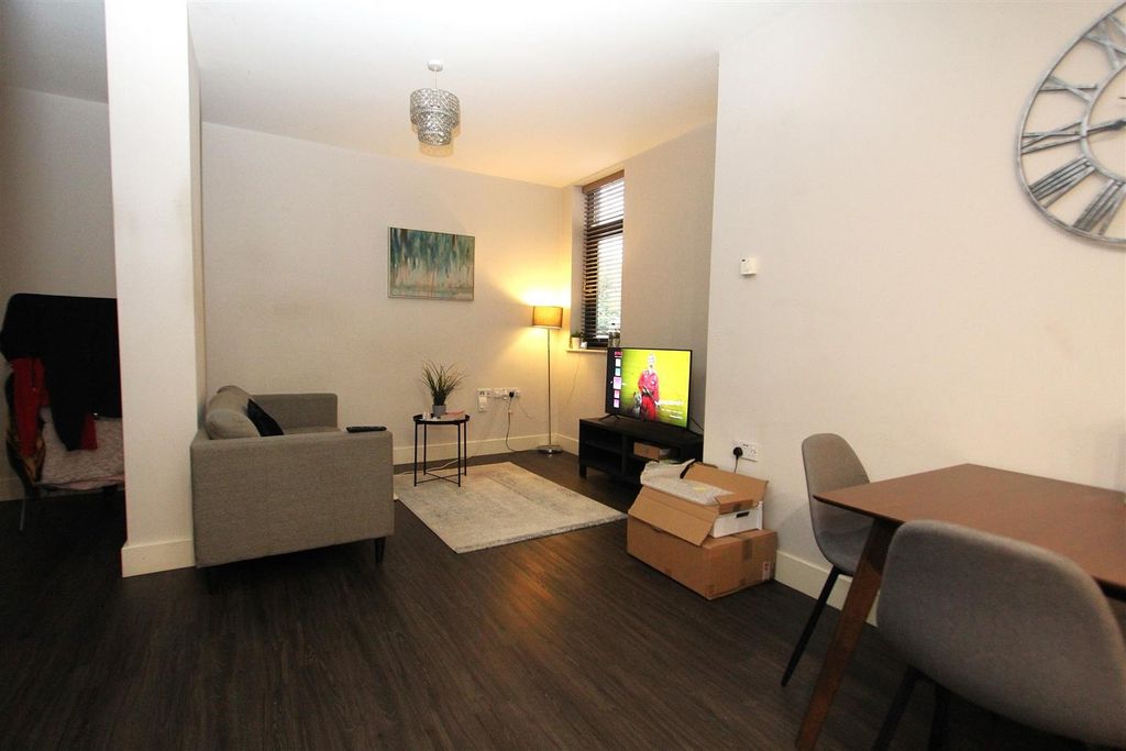 Property photo 1 of 9 Bright Lounge With Sleek Flooring And Dining Space...