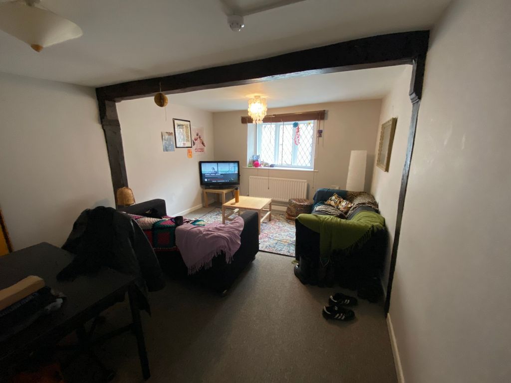 Property photo 3 of 9 A Cozy Living Room Featuring A Comfortable Seating...