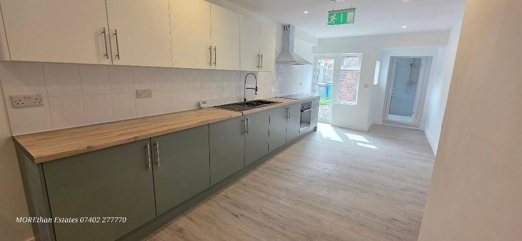 Property photo 2 of 12 Bright Kitchen With Modern Cabinets And Space....