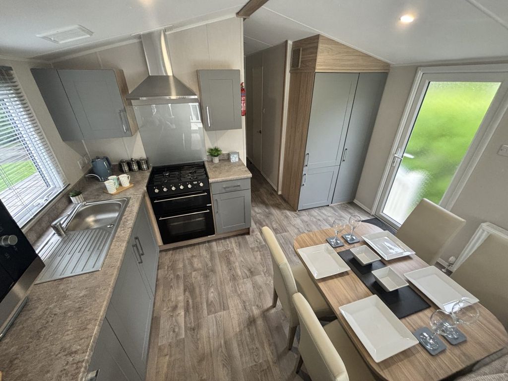 Property photo 3 of 4 Modern Fitted Kitchen And Dining Area Inside The Willerby Malton