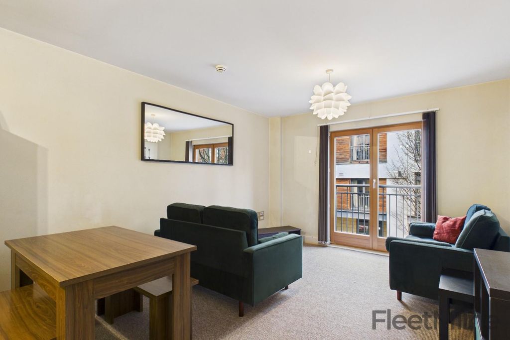 Property photo 1 of 12 Living Area