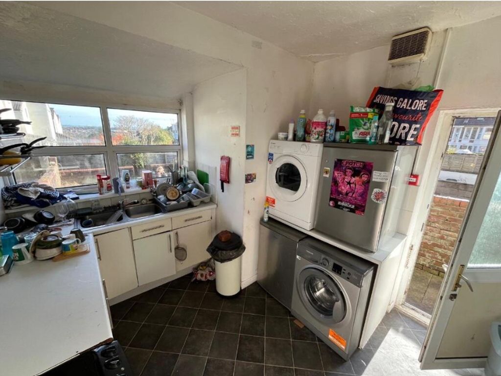 Property photo 2 of 12 A Compact Kitchenette With Ample Natural Light And...