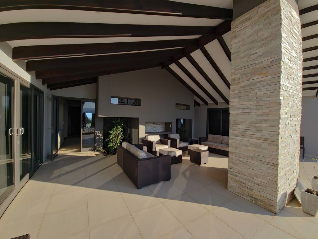 Property photo 3 of 65 North Facing Entertainment Area