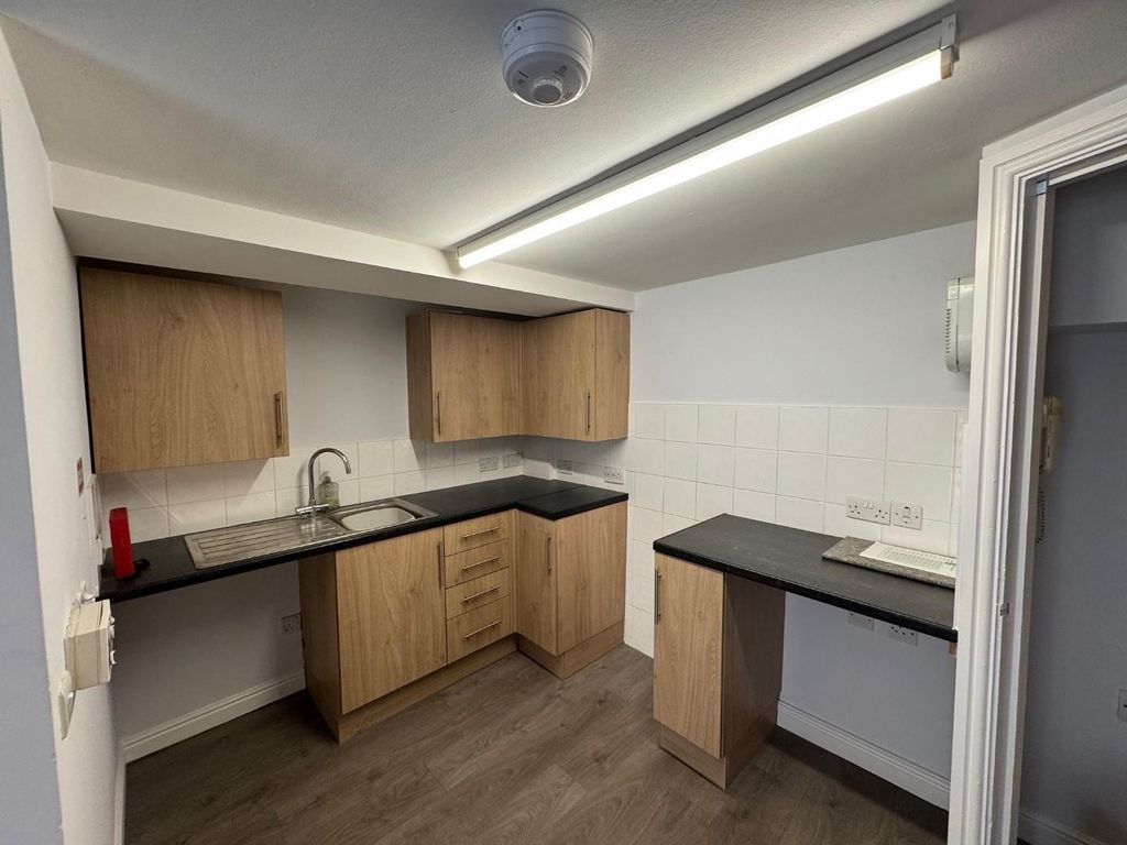 Property photo 3 of 13 Kitchen Area