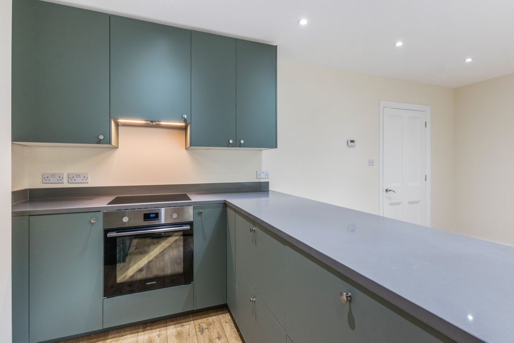 Property photo 3 of 8 Kitchen