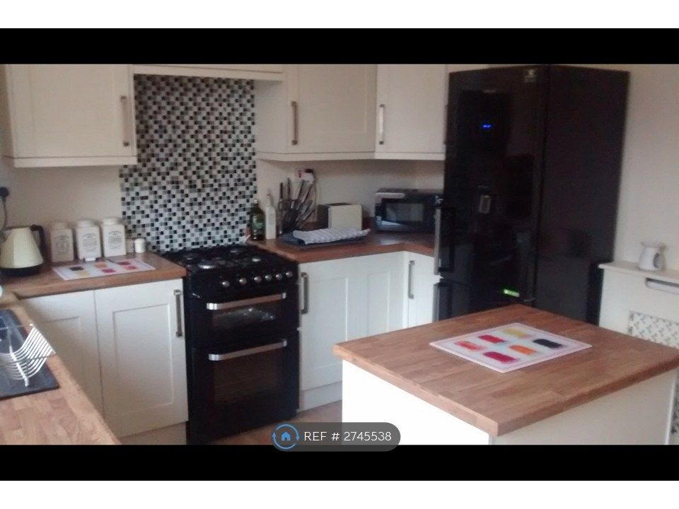 Property photo 1 of 7 Kitchen With Island