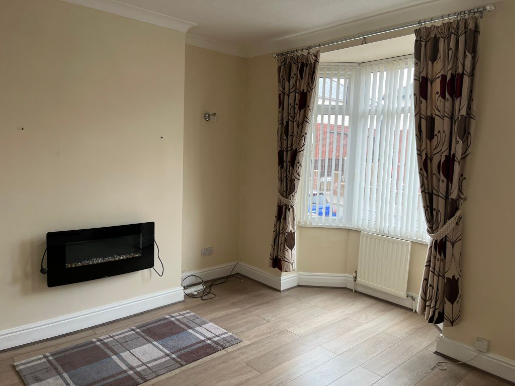 Property photo 2 of 8 Living Room