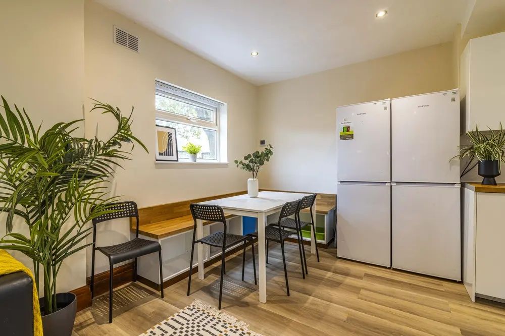 Property photo 3 of 10 Bright And Modern Kitchen Featuring Ample Natural ...