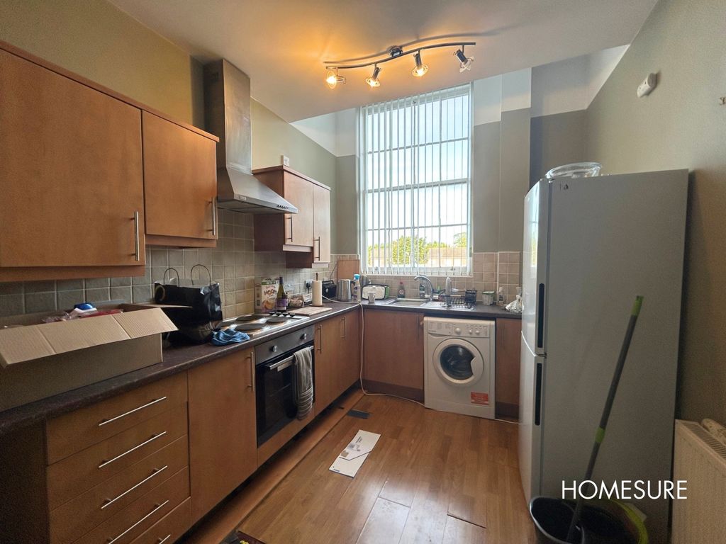 Property photo 3 of 7 Kitchen