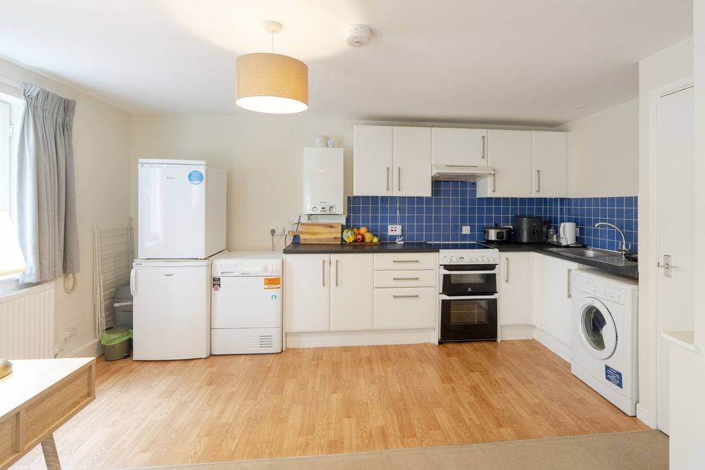 Property photo 3 of 8 Kitchen
