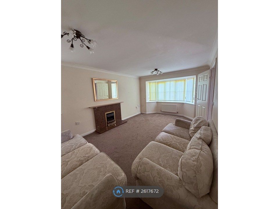 Property photo 3 of 23 Lounge With Fireplace