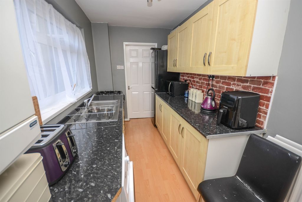 Property photo 3 of 13 Kitchen