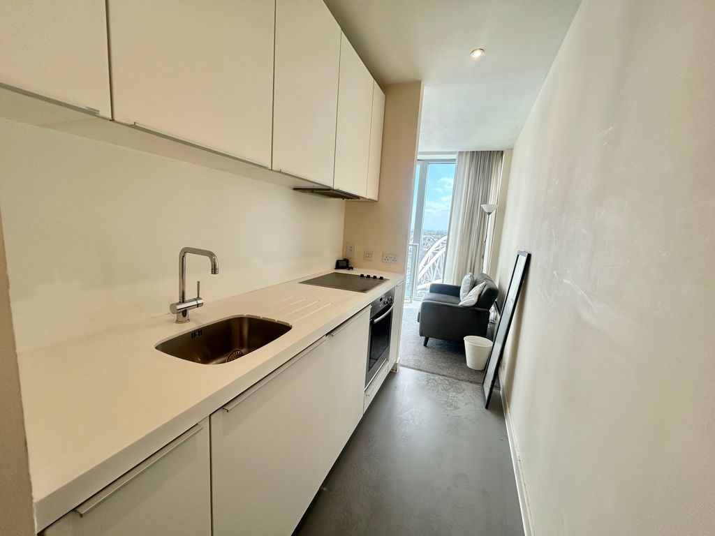 Property photo 1 of 5 Kitchen Into Lounge Area