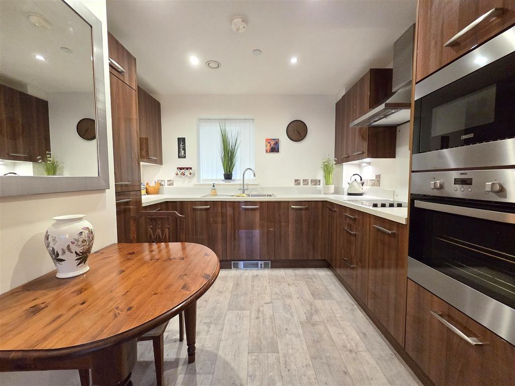 Property photo 2 of 15 Kitchen Area