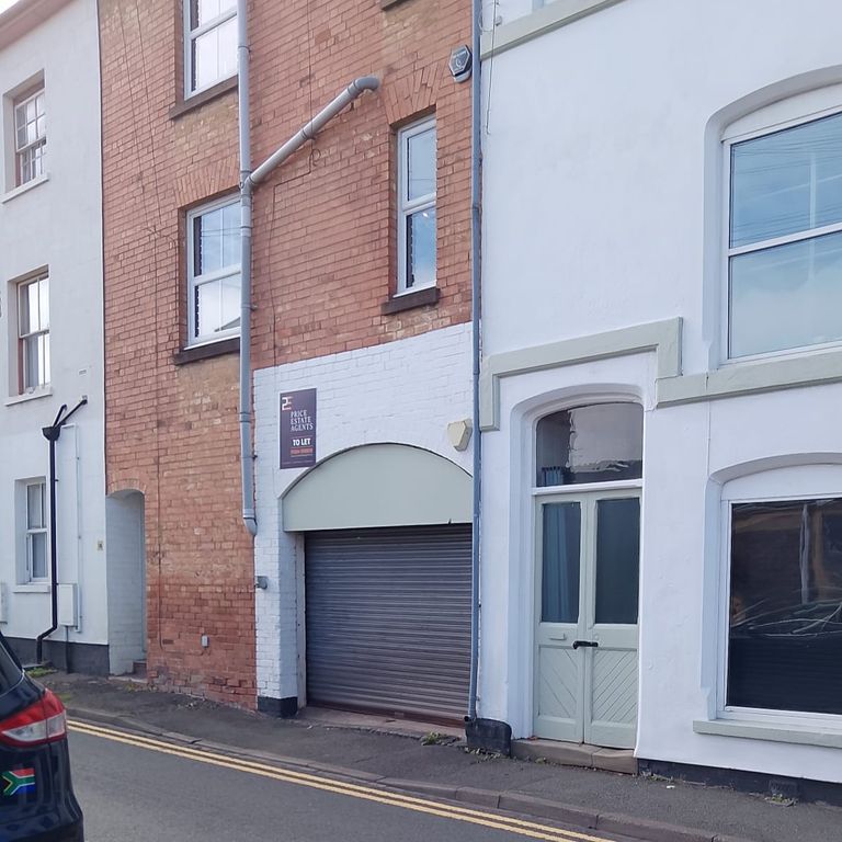Property photo 1 of 4 Front (Roller Shutter Door)
