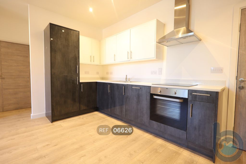 Property photo 3 of 18 Kitchen / Living Area