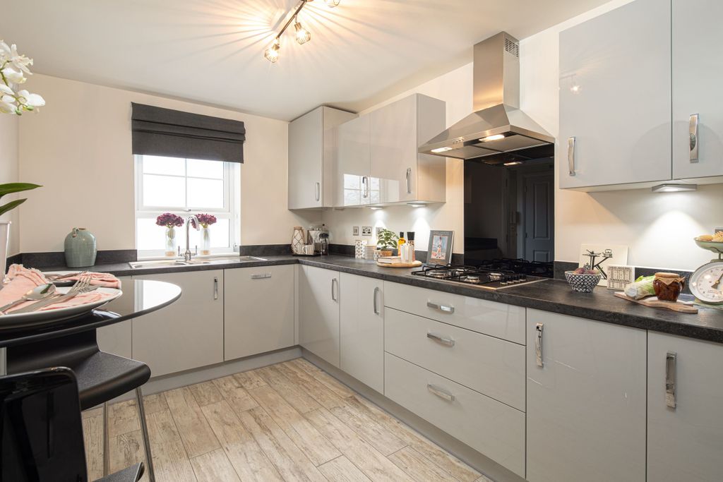 Property photo 1 of 8 Modern Kitchen In The Woodcote 4 Bedroom Home