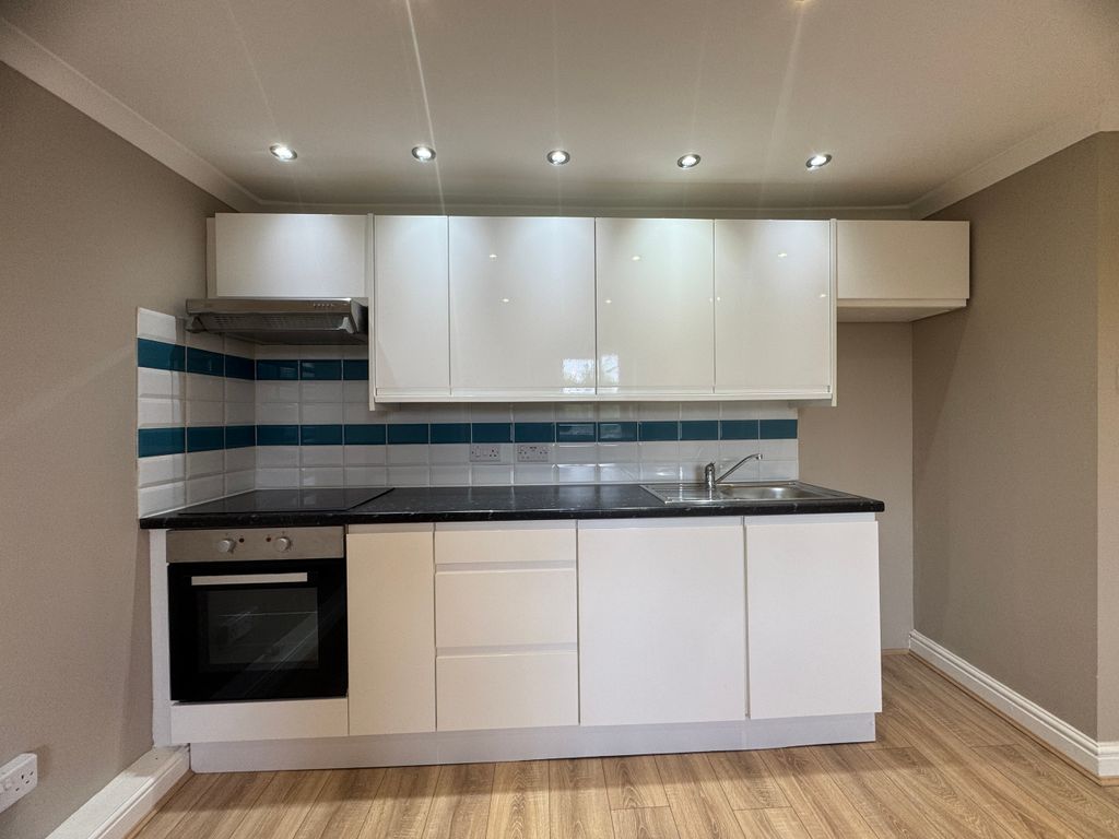 Property photo 1 of 7 Kitchen Area