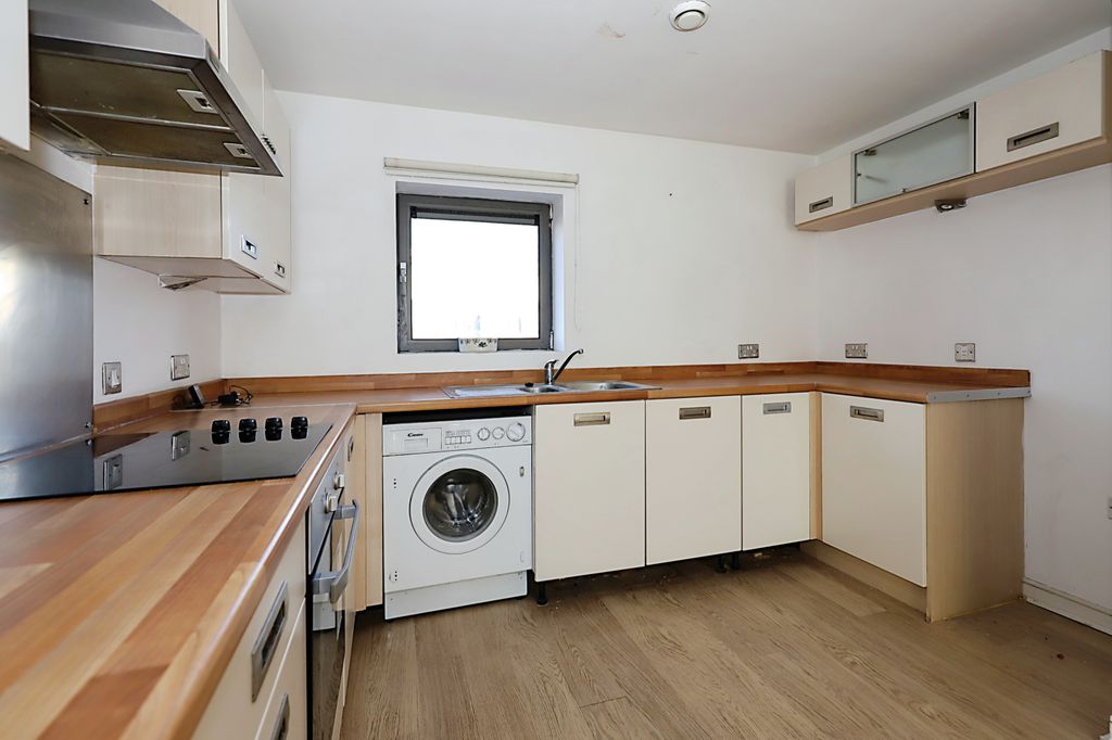 Property photo 3 of 9 Kitchen Area