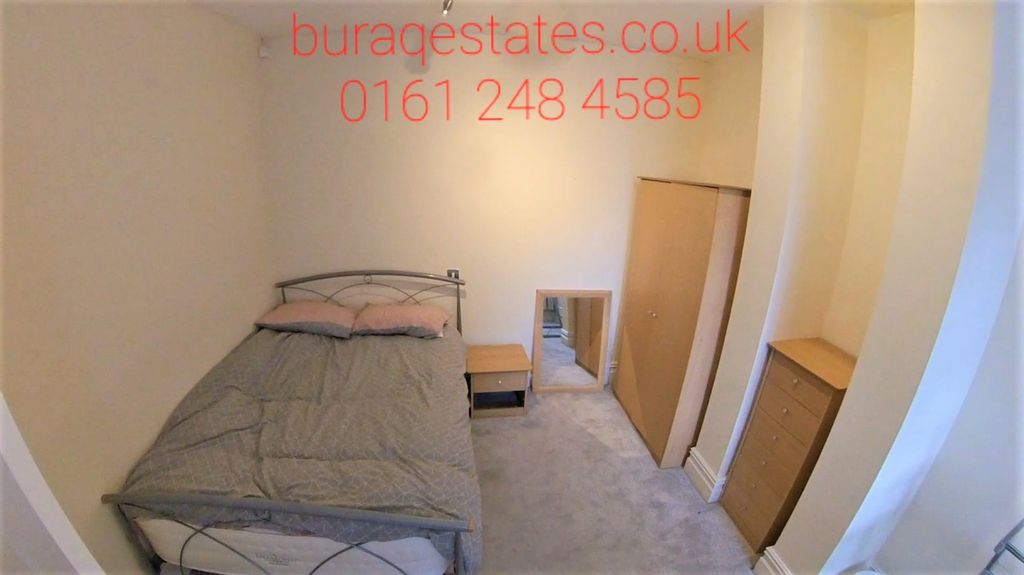 Property photo 1 of 15 Cozy Single Bedroom Featuring A Neat Bed With Warm...
