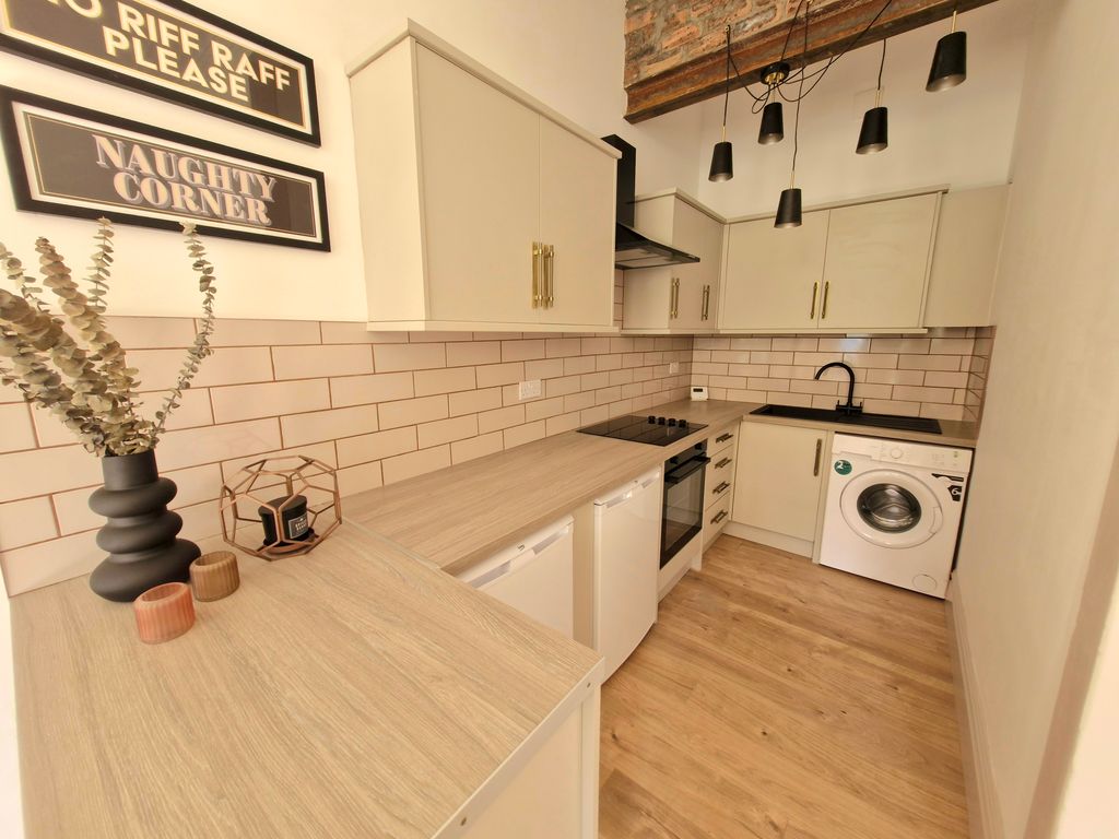 Property photo 3 of 7 Kitchen