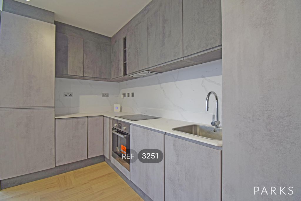 Property photo 2 of 9 Kitchen/Living Area