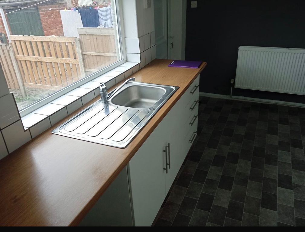 Property photo 3 of 13 Kitchen