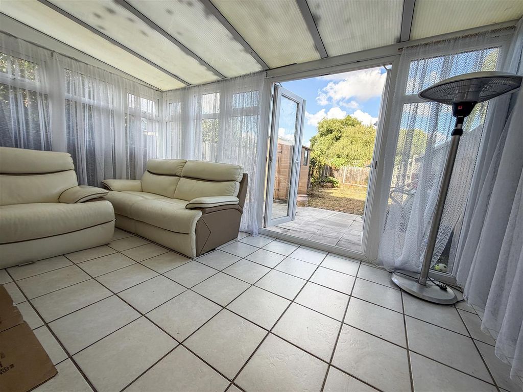 Property photo 3 of 12 Conservatory