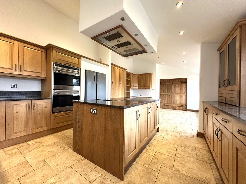 Property photo 3 of 12 Kitchen