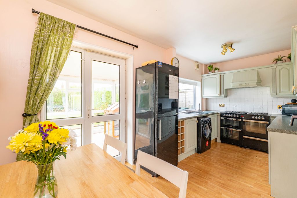 Property photo 3 of 12 Dining Kitchen