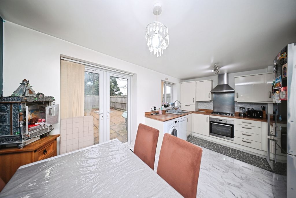 Property photo 2 of 13 Dining Kitchen