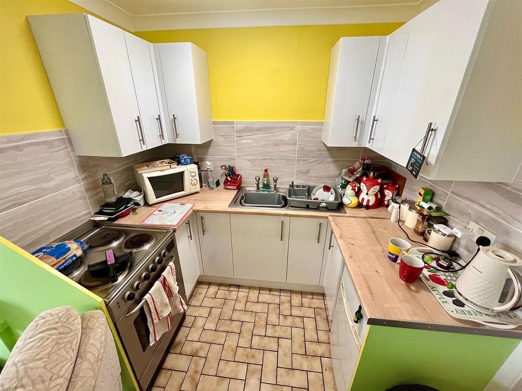 Property photo 3 of 8 Kitchen Area