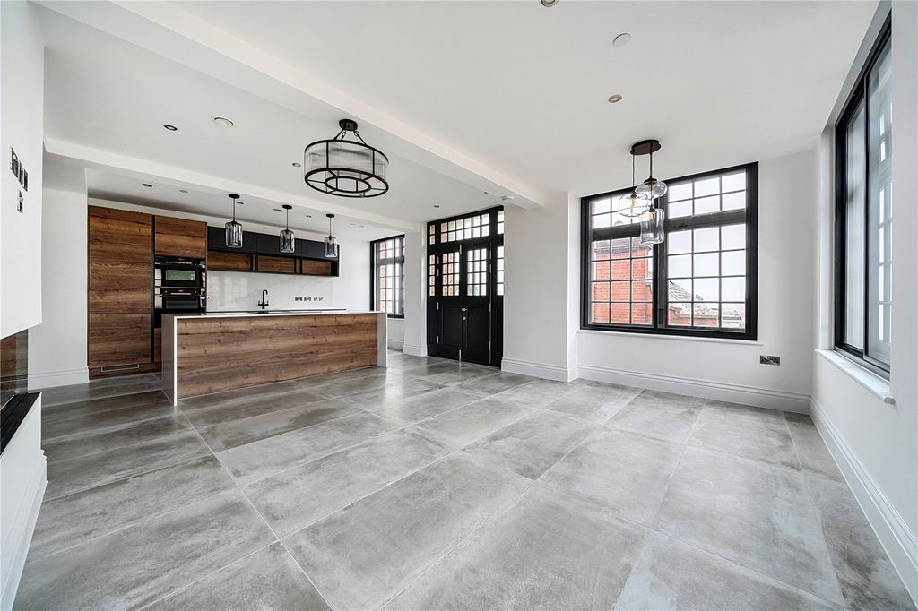 Property photo 2 of 9 Kitchen/Living Area