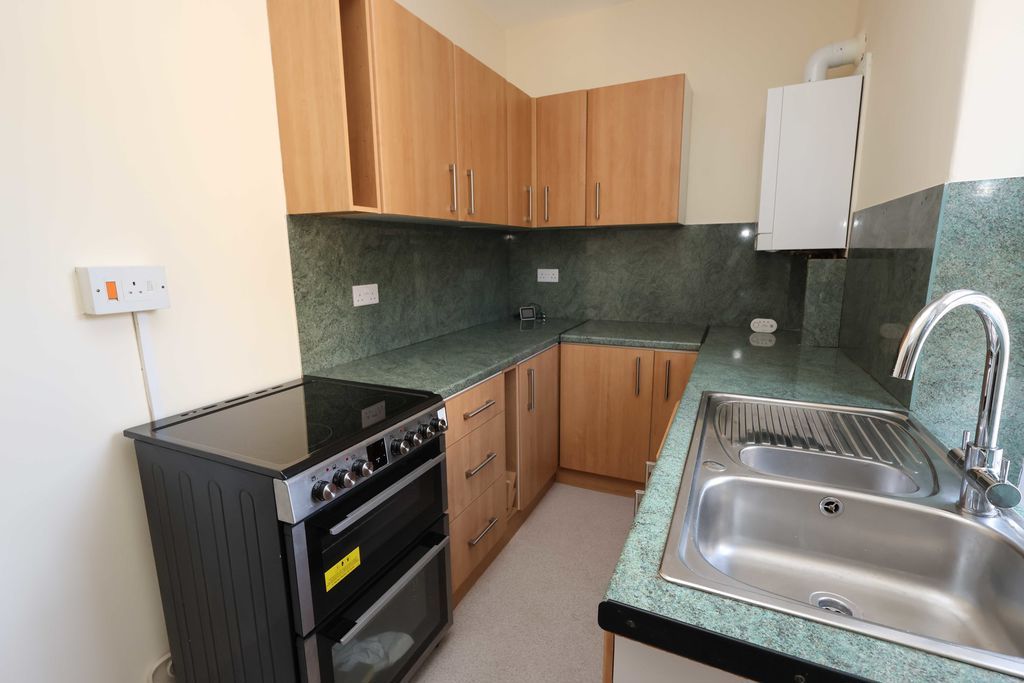 Property photo 3 of 8 Kitchen