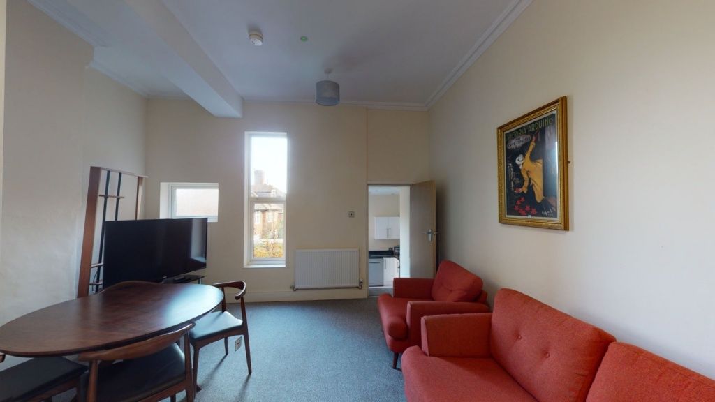 Property photo 2 of 5 A Bright And Comfortable Living Room Featuring A R...
