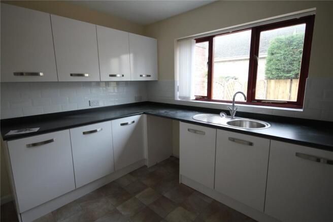 Property photo 2 of 7 Kitchen