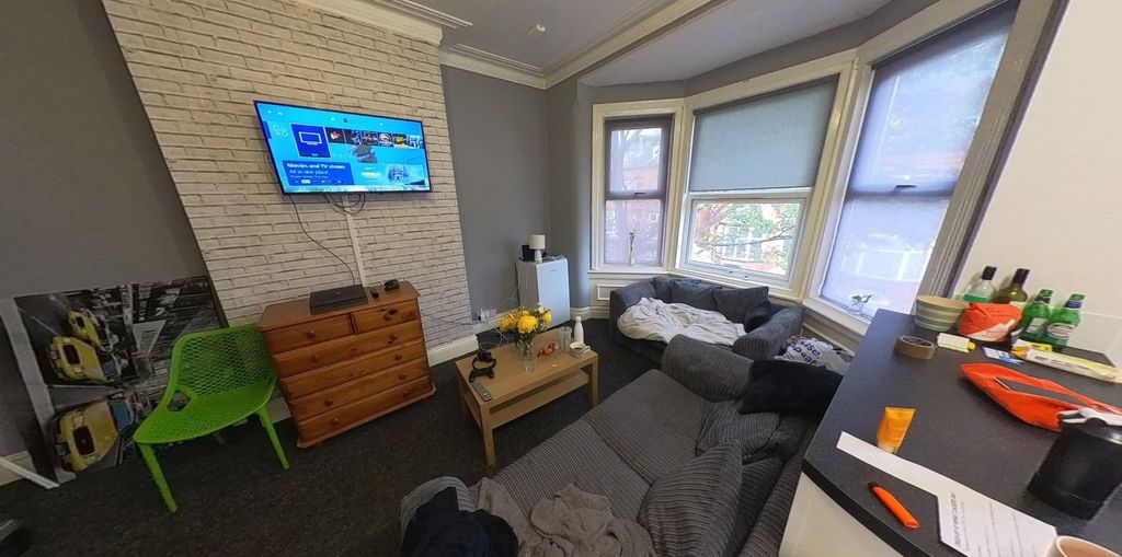 Property photo 2 of 6 A Bright And Spacious Living Room With Ample Natur...