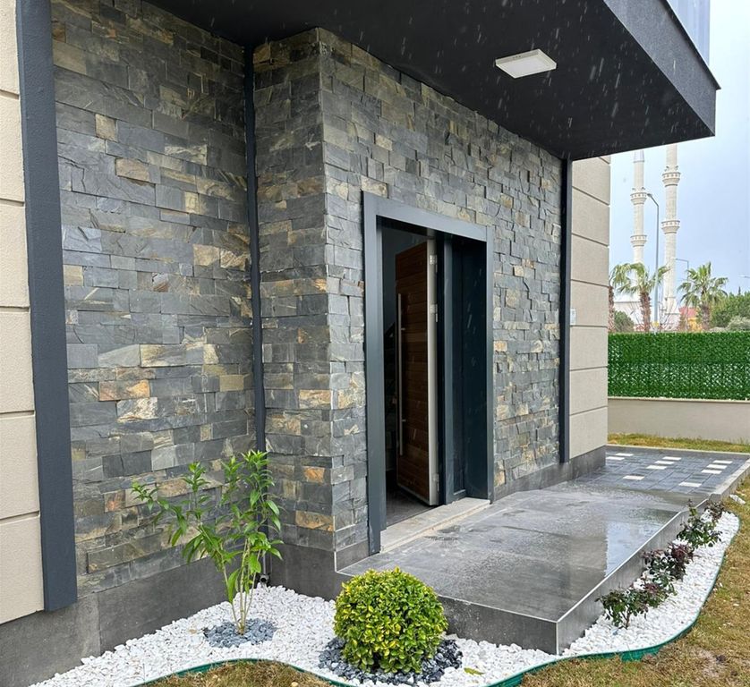 Property photo 2 of 20 Brand-New Antalya Property For Sale With A Pool And Garden - Pretty Entrance From The Garden