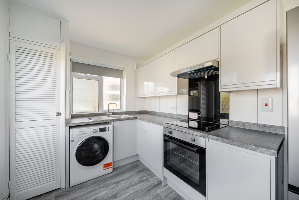 Property photo 3 of 12 Kitchen