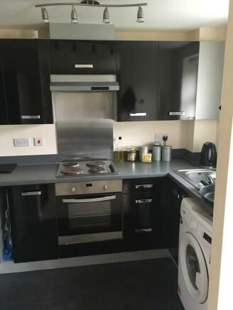 Property photo 3 of 8 Kitchen