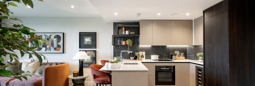 Property photo 1 of 5 View Of Kitchenette With Attached Island And Living Space Adjacent.