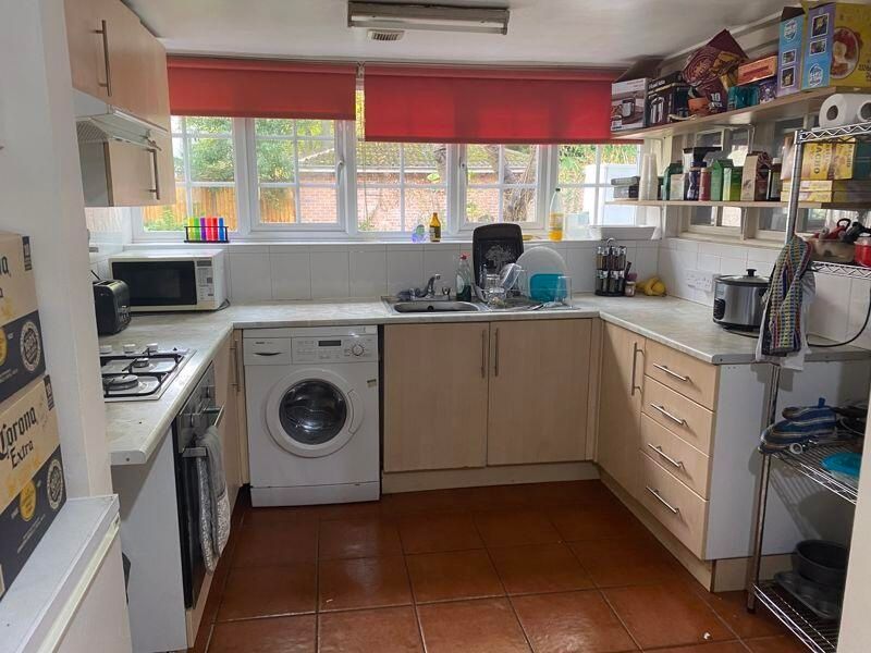 Property photo 2 of 15 A Bright, Well-Organized Kitchen Featuring Modern ...