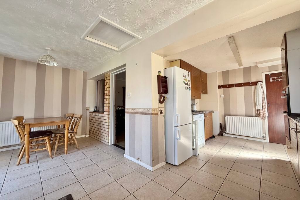 Property photo 2 of 10 L-Shaped Kitchen/Dining Room