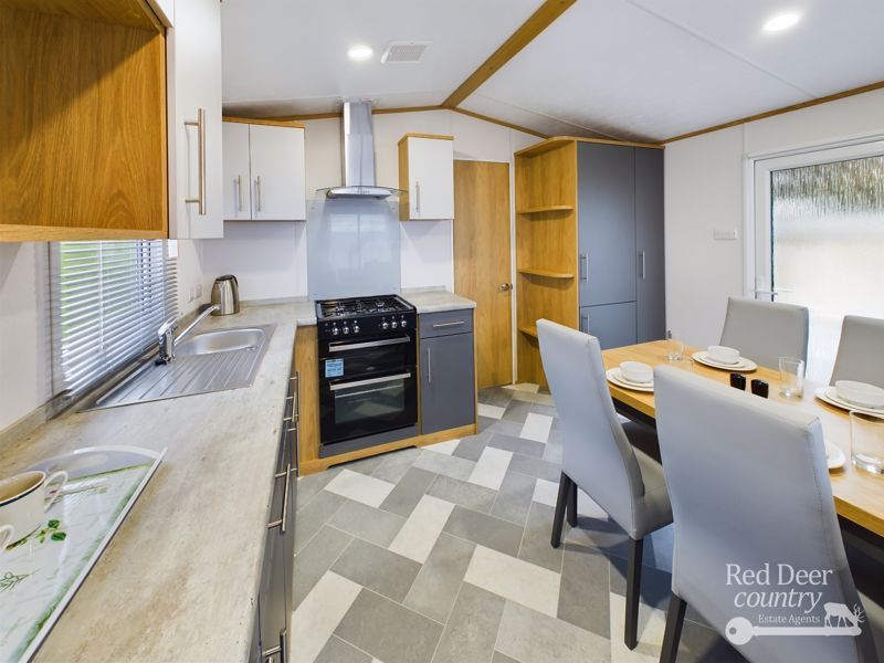 Property photo 3 of 13 Kitchen