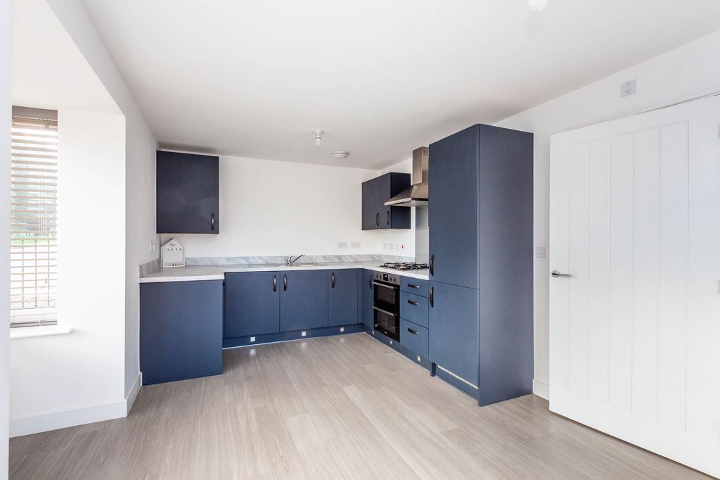 Property photo 2 of 15 Kitchen Area