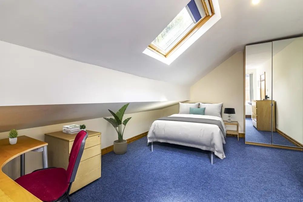 Property photo 2 of 8 Bright And Inviting Double Bedroom Featuring A Com...